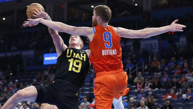 Dec 11, 2023; Oklahoma City, Oklahoma, USA; Oklahoma City Thunder forward Davis Bertans (9) defends a shot by Utah Jazz forward Luka Samanic (19) during the second half at Paycom Center